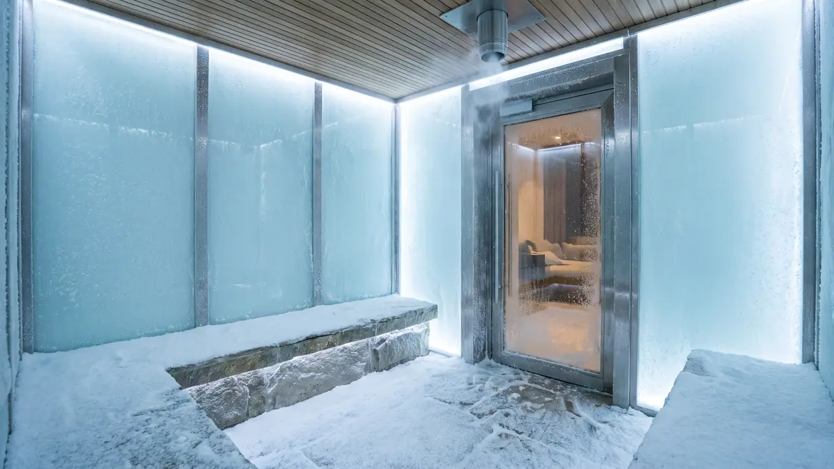 Snow room with real powder snow and ice-blue lighting in a Dubai villa spa